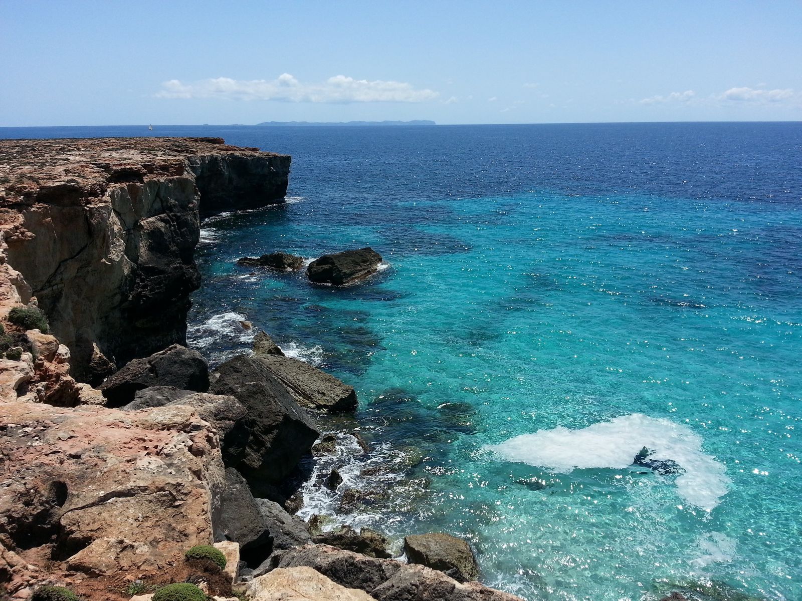 Hidden beach cove in Mallorca with turquoise water